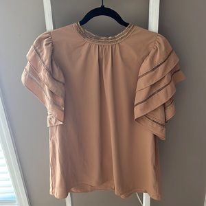 Perfect blouse for the office or a night out!